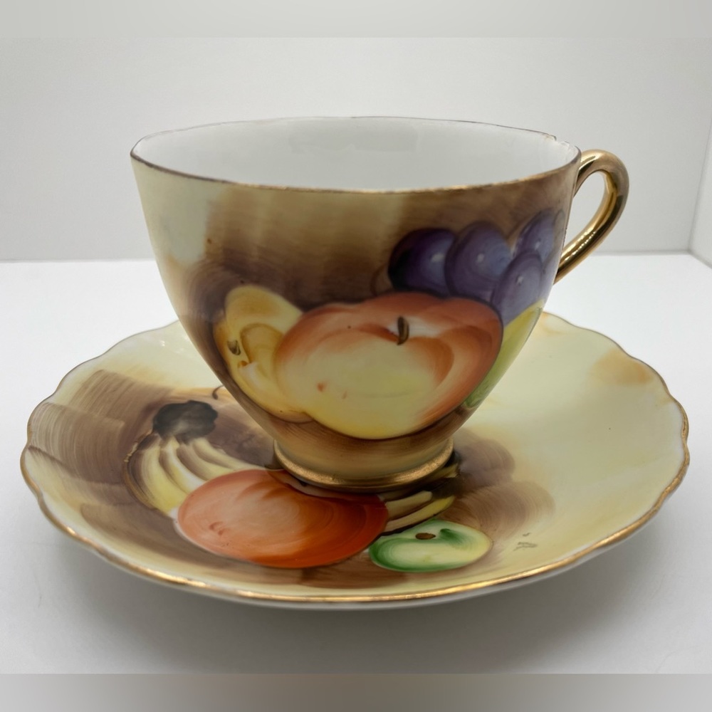 Vintage Enesco Fruit Pattern E1432 Teacup Saucer 
gold trim, hand painted, 5.5”